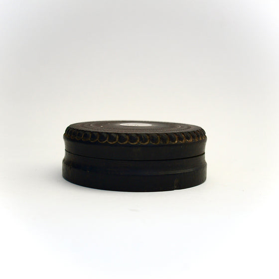 Ebony lathe turned circular Snuff Box.